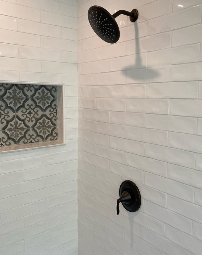 Experience the exceptional craftsmanship of Alternate Design Plumbing, Inc. with our stylish and modern shower installations.