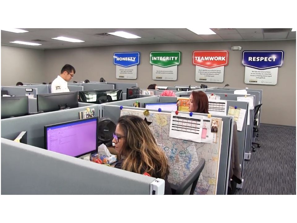 Friendly dispatch and organized scheduling in a clean office showcase how Abacus Plumbing, Air Conditioning & Electrical delivers reliable, customer-focused service.