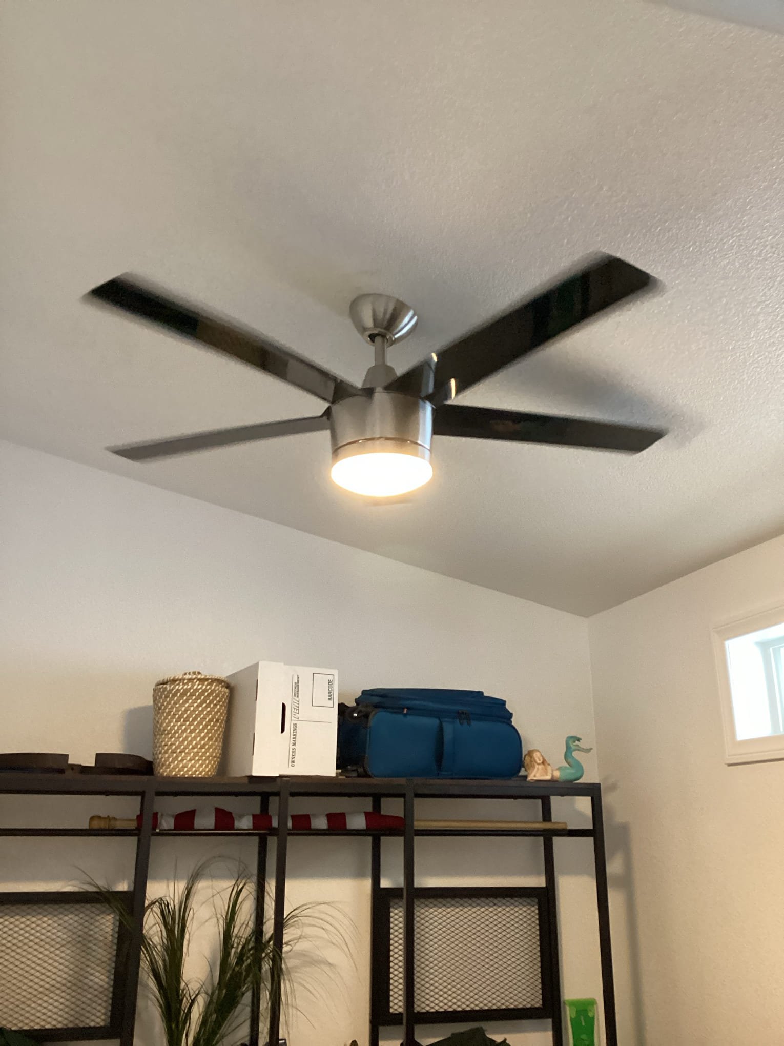 A sleek, professionally installed ceiling fan adds comfort and style while Powell Electric ensures reliable, tidy electrical work.