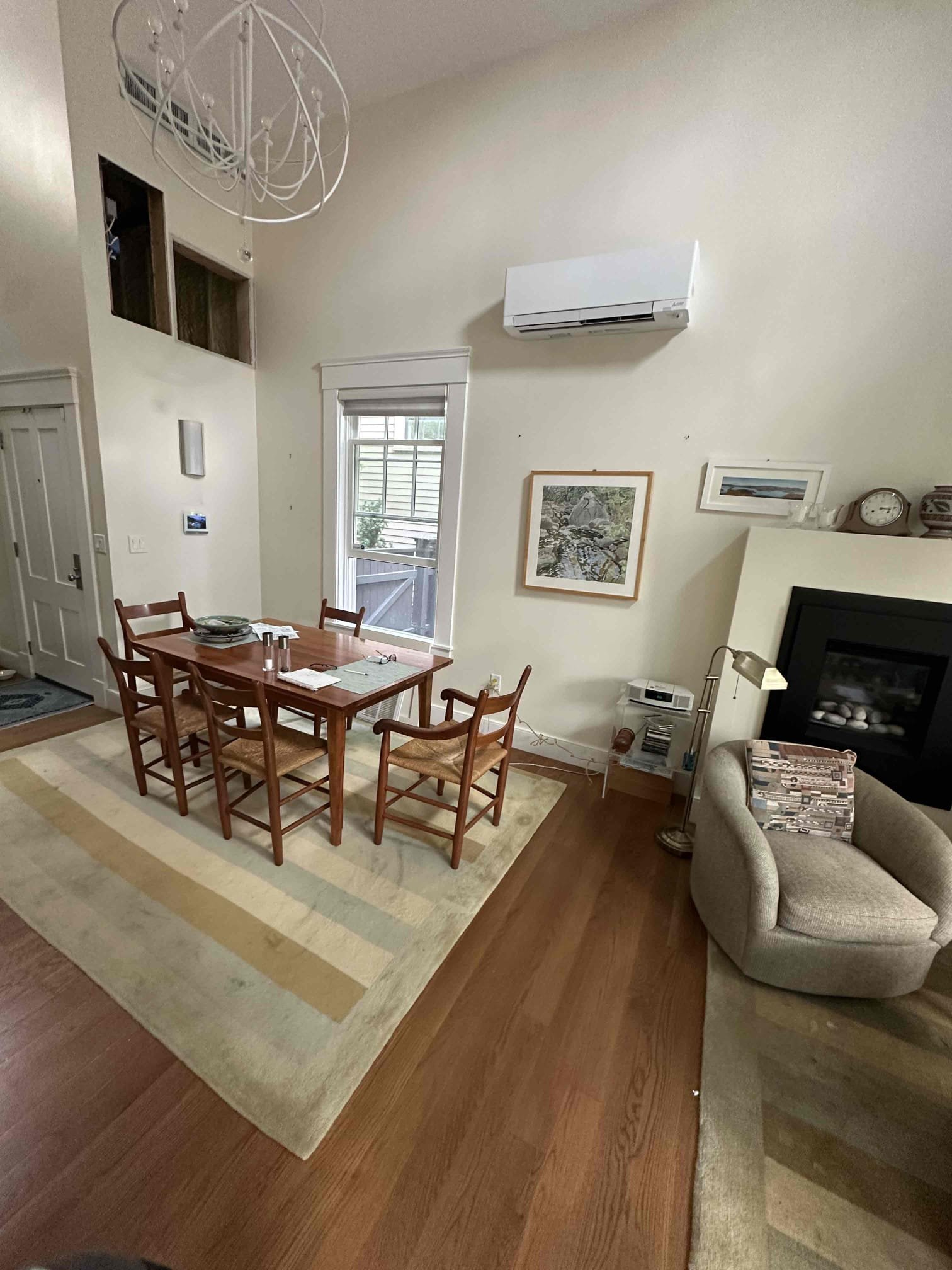 A clean, professionally installed ductless AC brings comfortable, quiet climate control to this home, showcased by Akian Plumbing, Heating, Cooling & Electric.