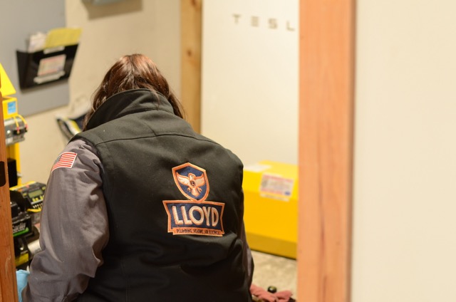 A Lloyd Plumbing, Heating, Air, Electrical technician demonstrates careful, professional workmanship during a service visit to ensure lasting comfort for your home.