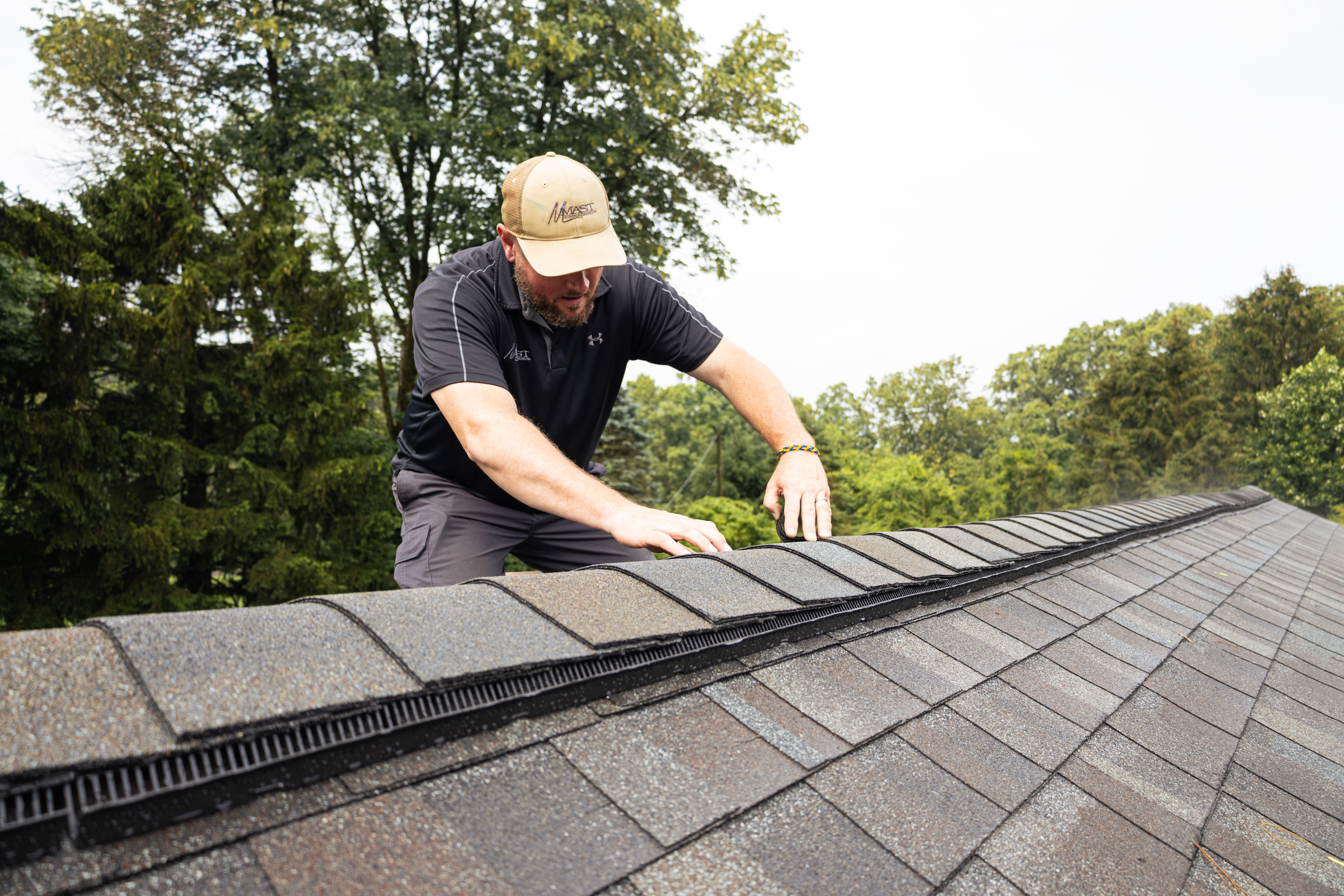 Experience premium roofing services with Mast Roofing & Construction, ensuring quality and professionalism at every step.