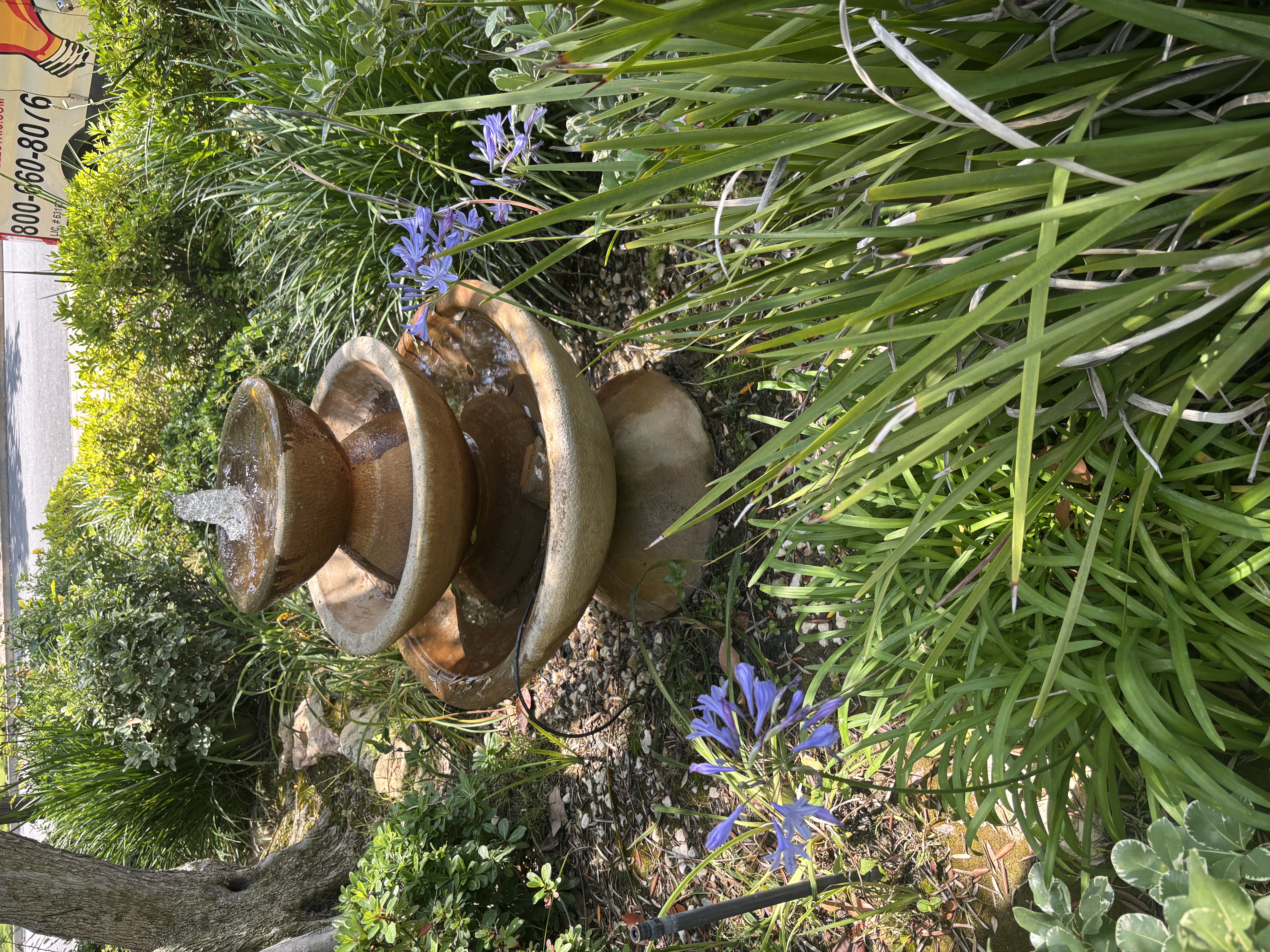 A beautifully maintained garden fountain shows Powell Electric's attention to reliable installations and tasteful outdoor presentation.