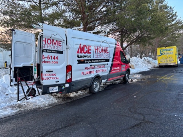 Parrish Services shows dependable, on-site expertise with fully equipped service vans ready to handle heating, plumbing, and electrical needs.