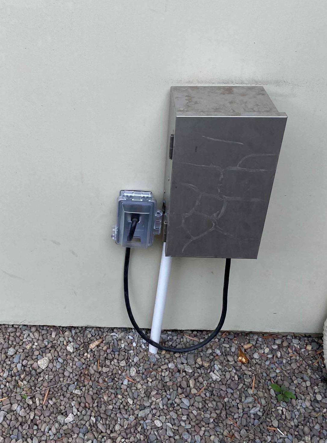 Powell Electric shows reliable outdoor electrical installation with weatherproof protection and neat conduit routing for long-lasting performance.