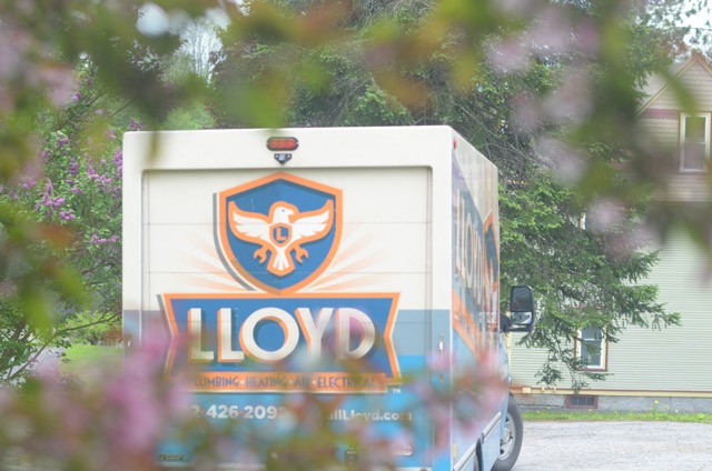A freshly branded Lloyd Plumbing, Heating, Air, Electrical van on-site reinforces our professional presence and dependable service to homeowners.