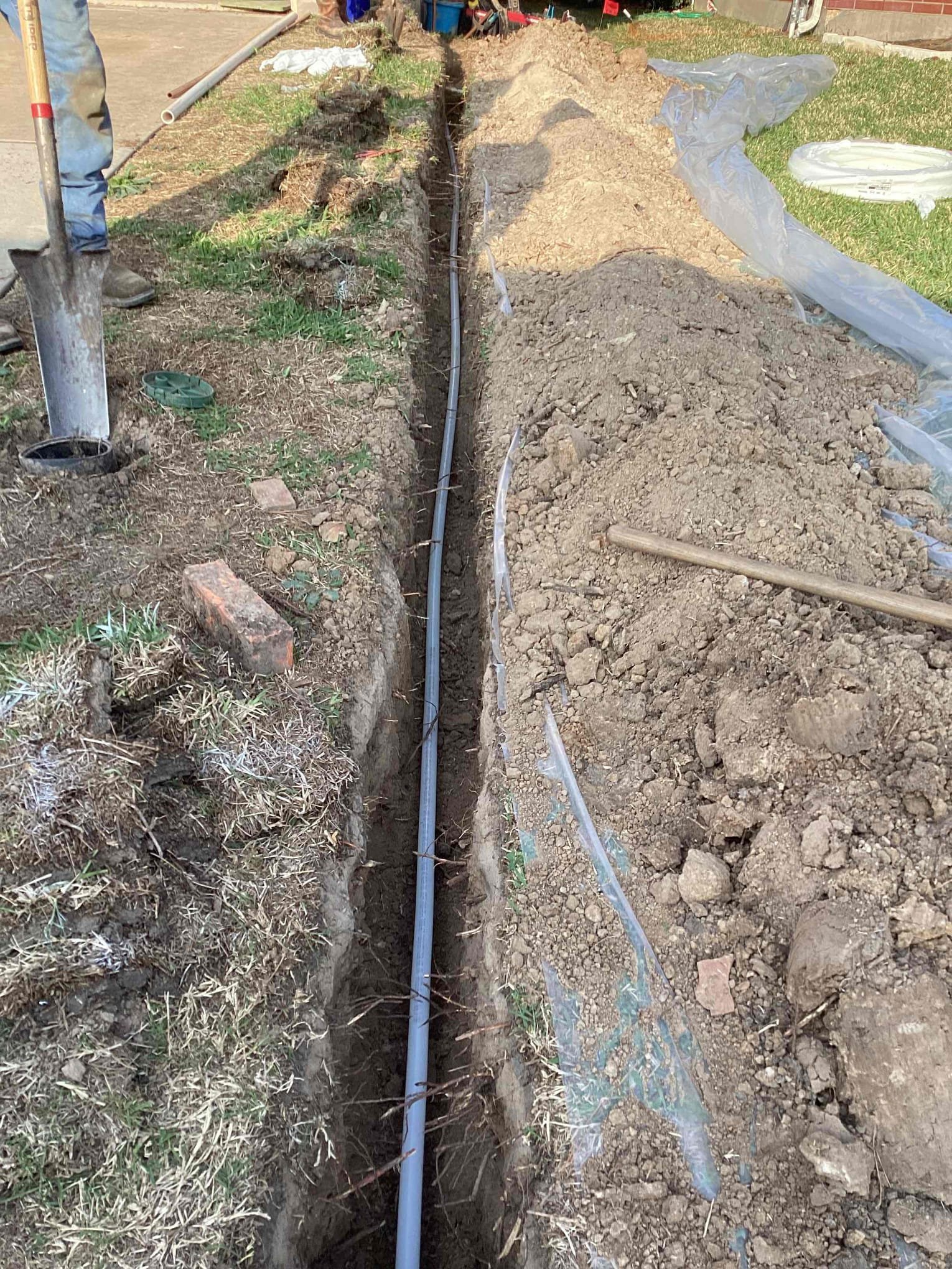 Careful trenching and conduit installation show the dependable workmanship customers expect from Abacus Plumbing, Air Conditioning & Electrical.