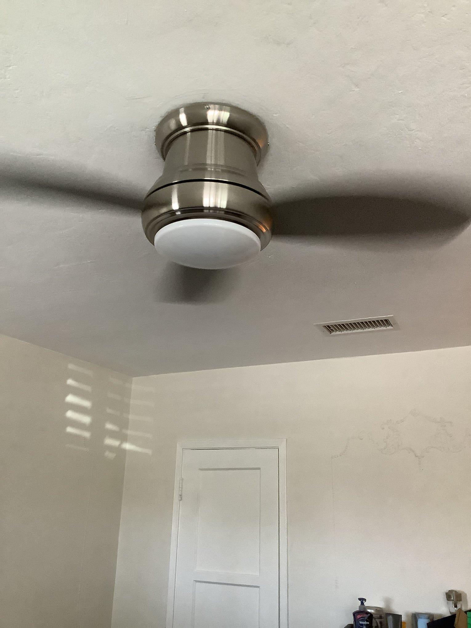 Powell Electric installed a sleek flush‑mount ceiling fixture that improves room lighting and shows careful, safe workmanship.