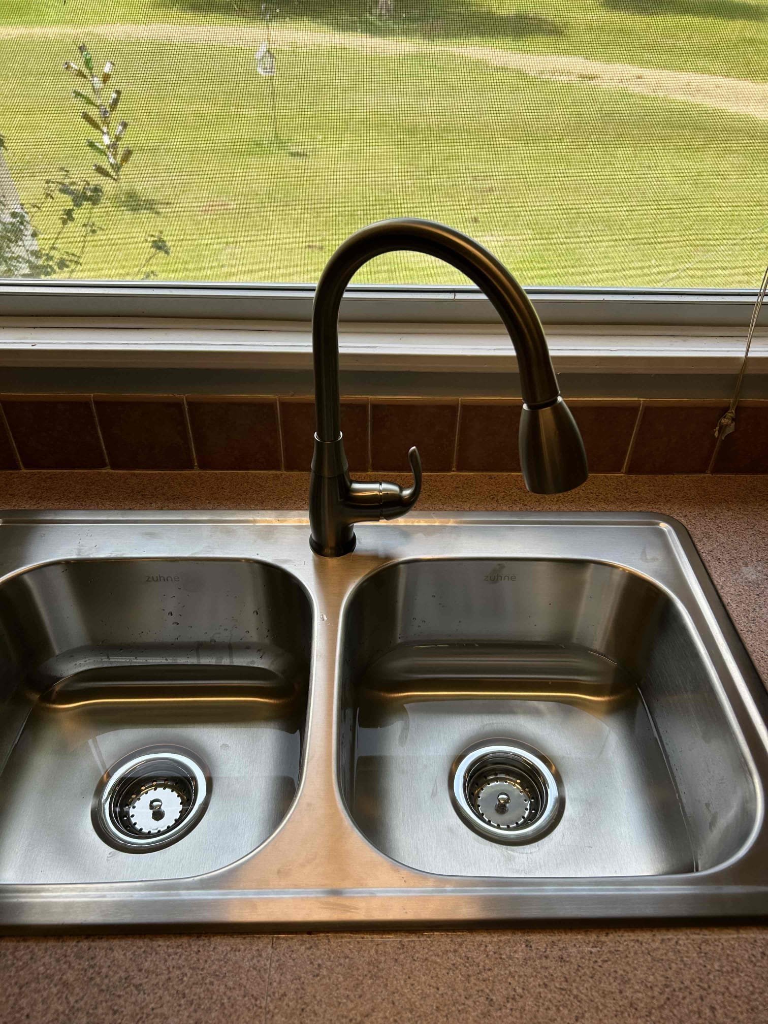 Experience the elegance and reliability of Parobek Plumbing & Air Conditioning with our top-notch sink installations.