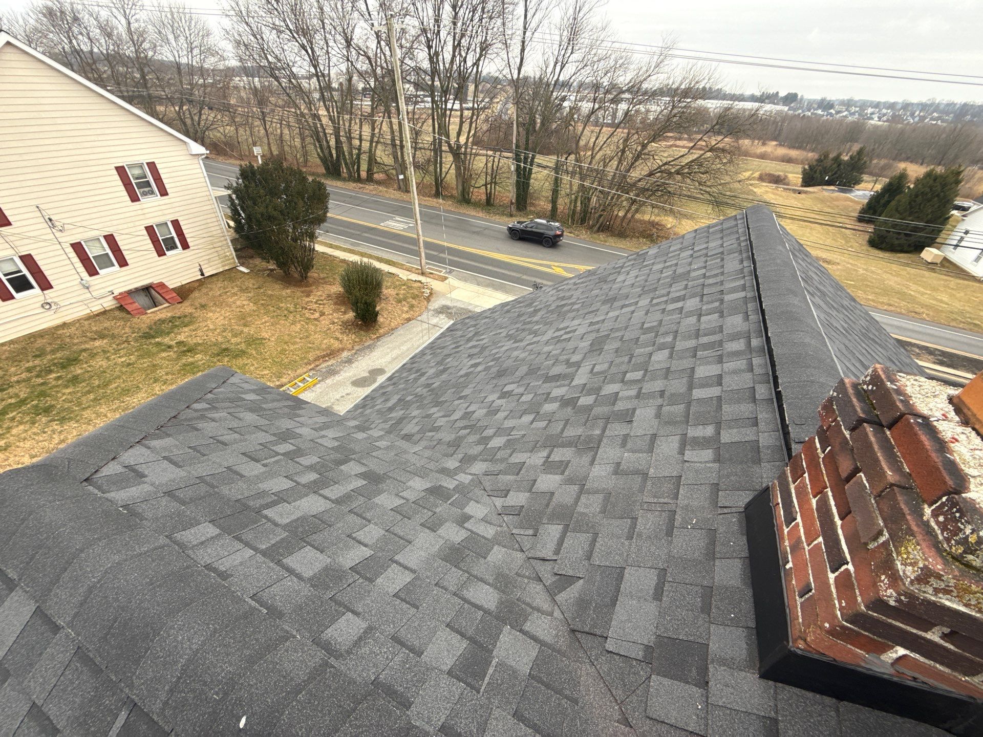 Showcasing durable, professionally installed shingles and precise chimney flashing, Mosaic Roofing & Exteriors protects your home with craftsmanship you can trust.