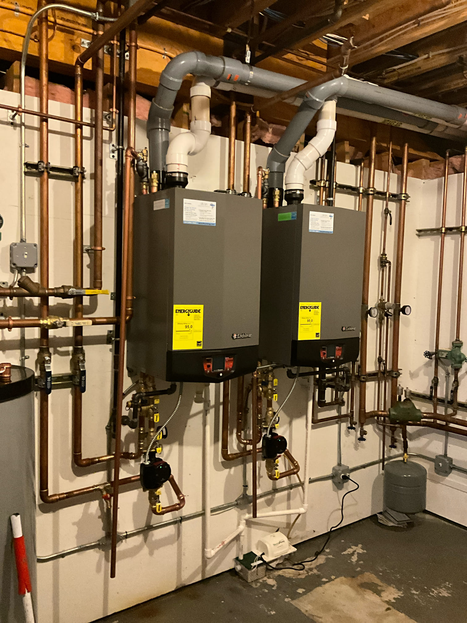 Clean, professional boiler installation demonstrates reliable craftsmanship and energy efficiency from Akian Plumbing, Heating, Cooling & Electric.