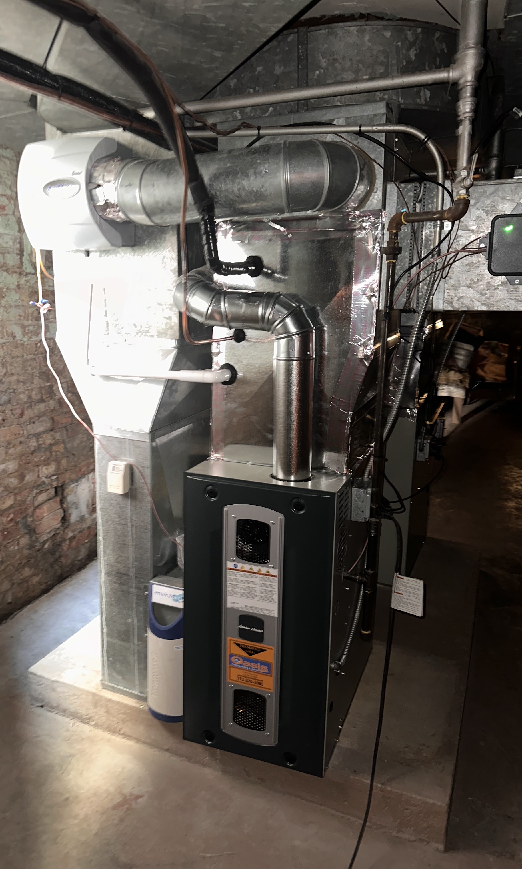 Oasis Heating and Cooling demonstrates dependable workmanship and clean installation in this basement furnace setup, giving homeowners lasting comfort and value.