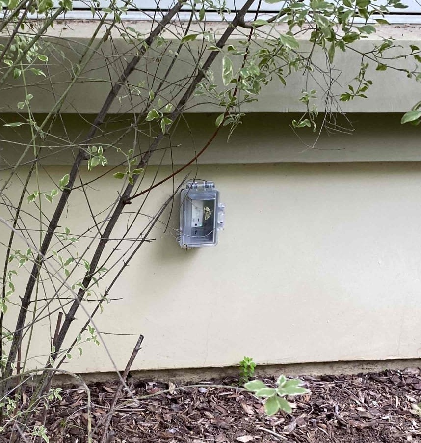 A neat, code-minded outdoor outlet installation shows Powell Electric’s attention to durable, safe exterior electrical work.
