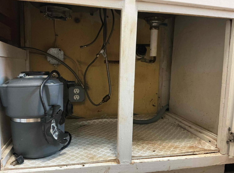 Hope Plumbing restored this messy under-sink area to safe, reliable condition, showing our focus on clean, dependable repairs.