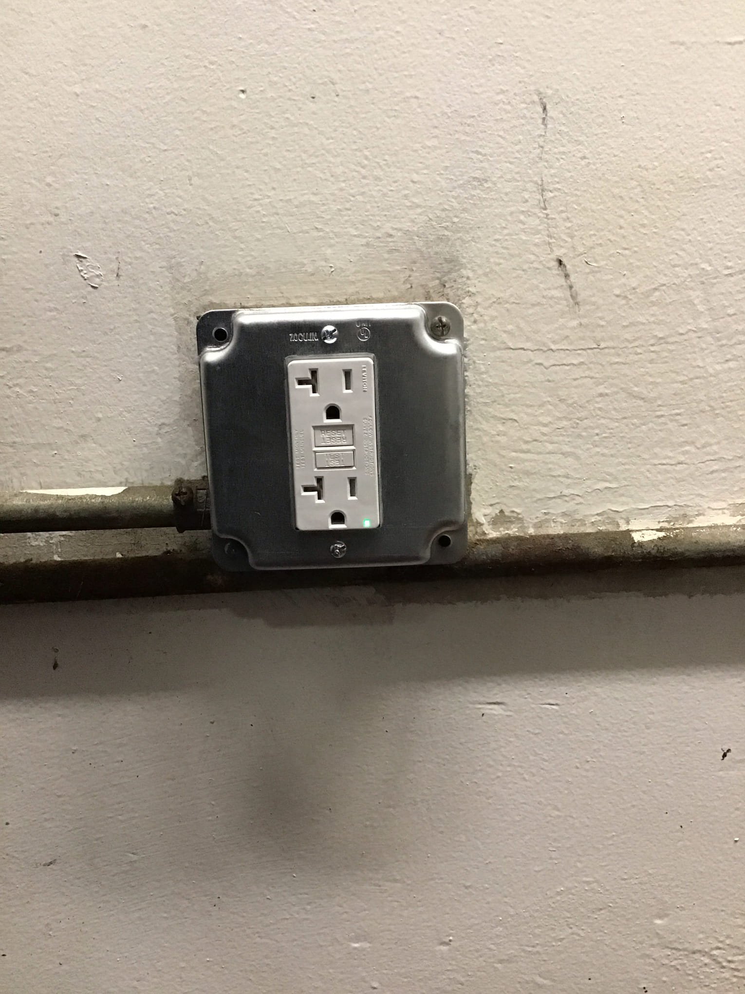 Powell Electric ensures safe, reliable outlets with neat metal box installation and GFCI protection to keep your home grounded and secure.