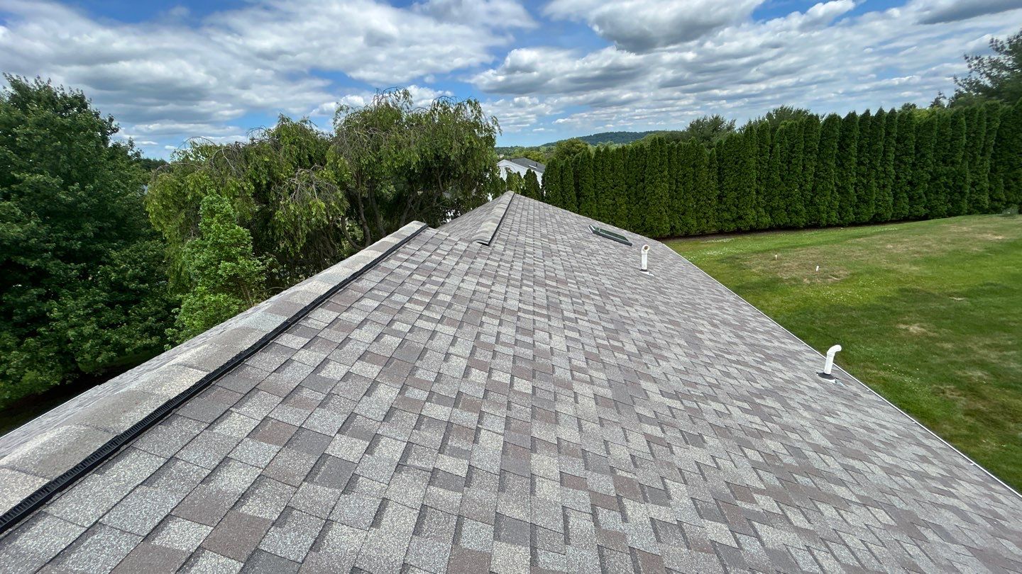 Reliable craftsmanship and attention to detail keep your home protected, Mast Roofing & Construction ensuring long-lasting shingle performance.
