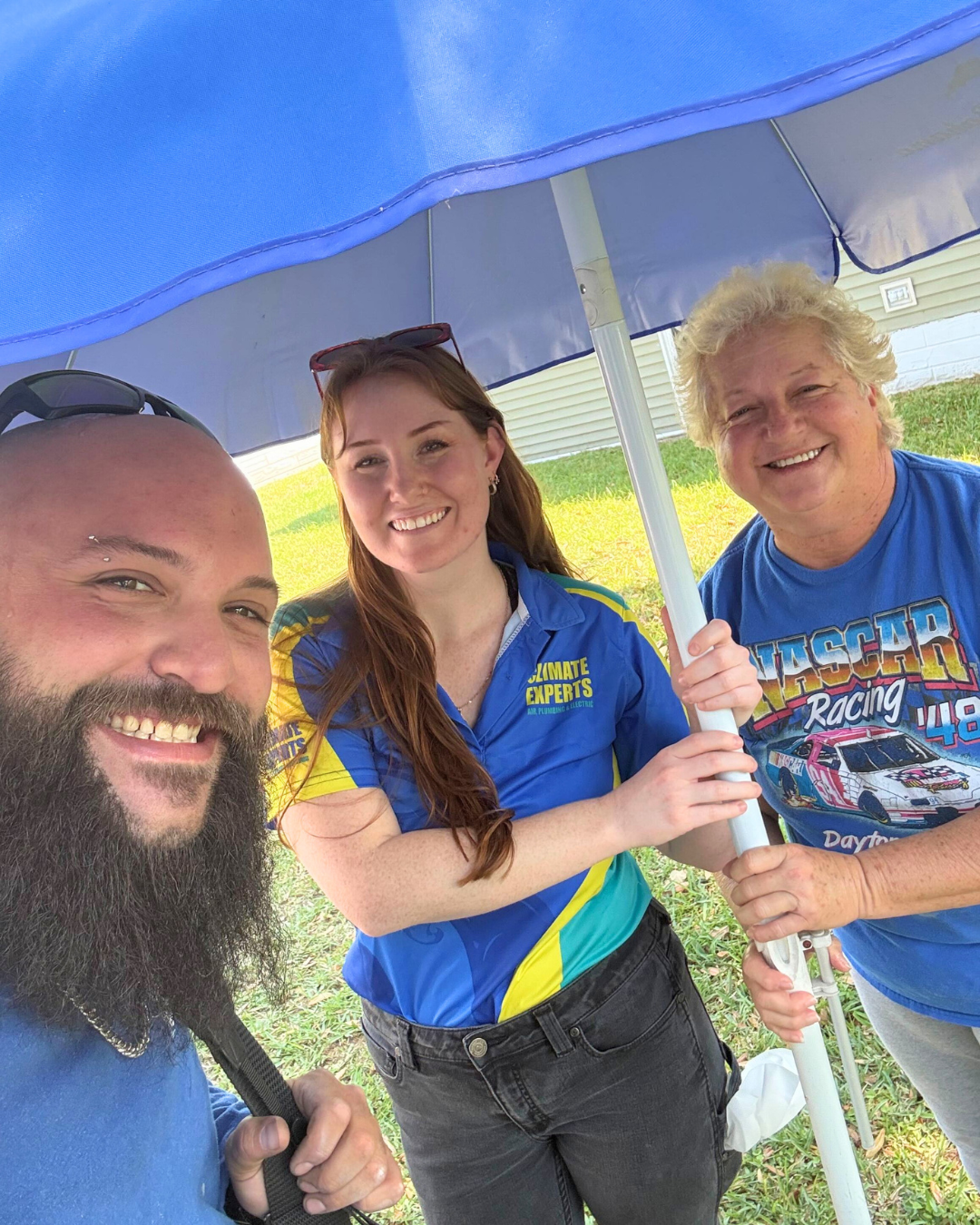 Smiling team members from Climate Experts Air, Plumbing & Electric show friendly, professional service that local customers can trust.
