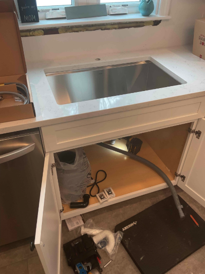 A fresh undermount sink installation showcases Hope Plumbing's attention to clean, reliable kitchen plumbing work.