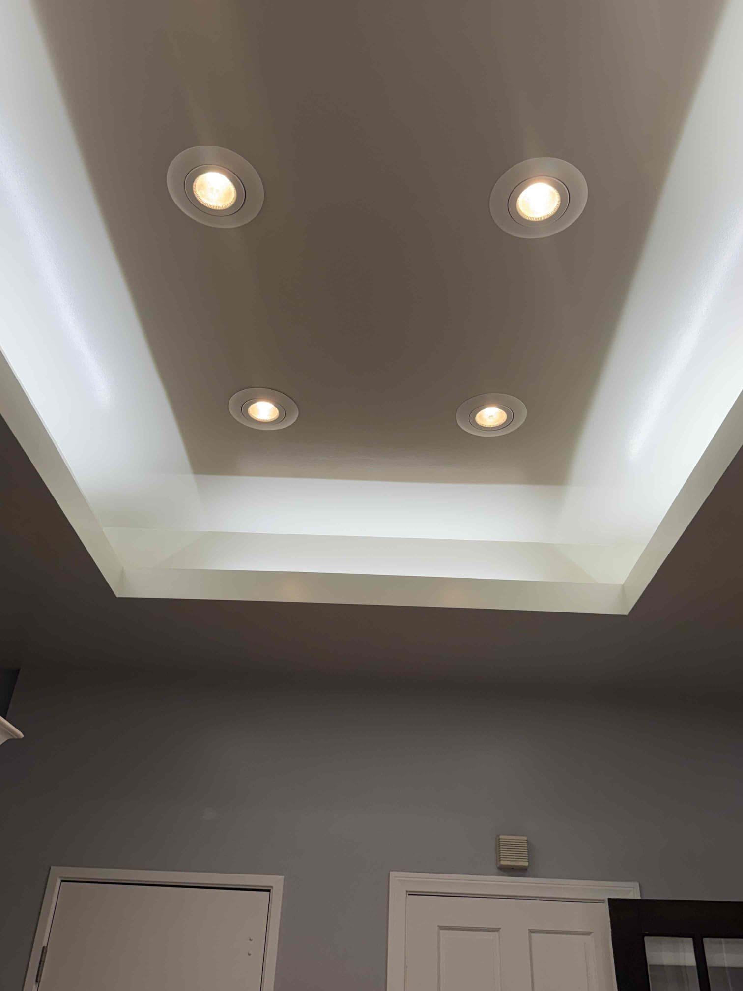 Bright, neatly installed recessed lighting and a crisp tray ceiling show Powell Electric’s commitment to clean, professional craftsmanship.