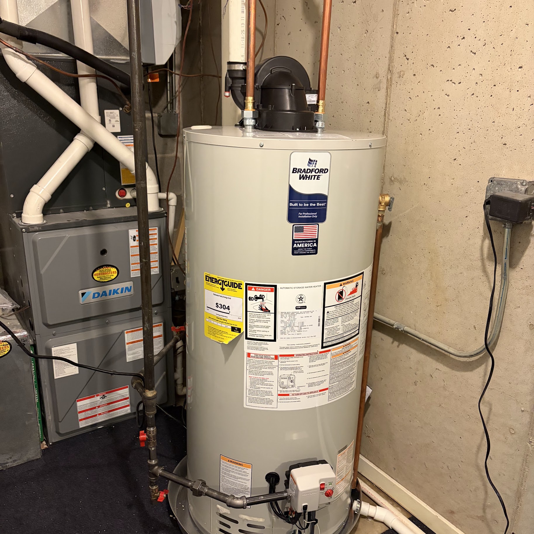 Reliable installations and neat workmanship make homeowners comfortable, as shown by the Bradford Heating and Cooling water heater setup.