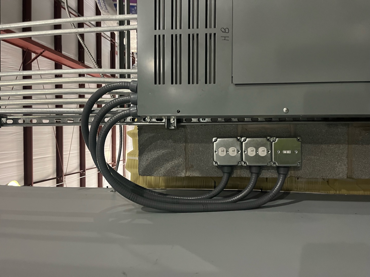 Clean, code-conscious conduit work highlights the craftsmanship customers trust from Atomic Electric Service Inc. for reliable electrical installations.