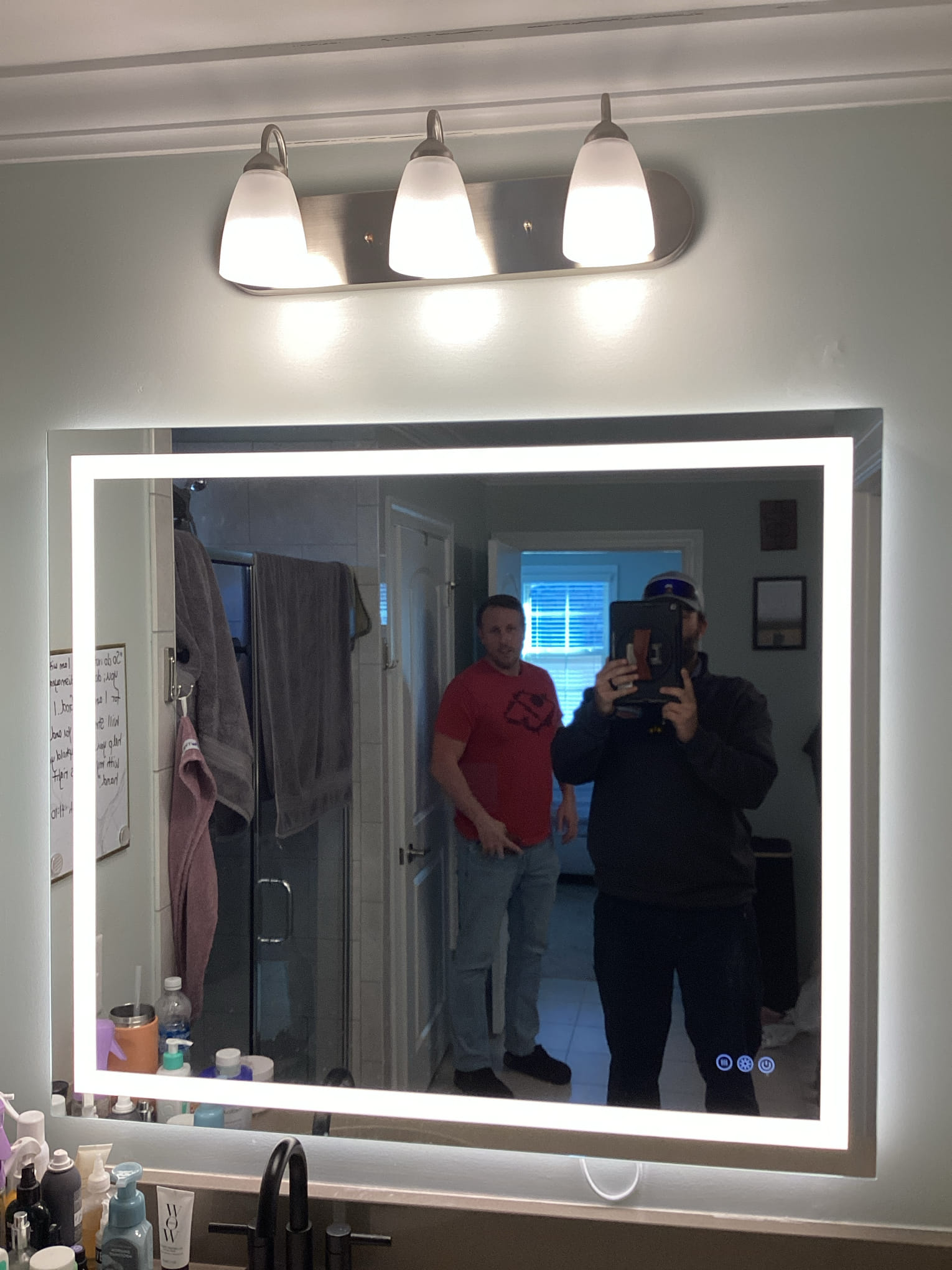 Bright, modern LED vanity installation by Dawson's Electric & Air highlights clean craftsmanship and lasting value for your bathroom.