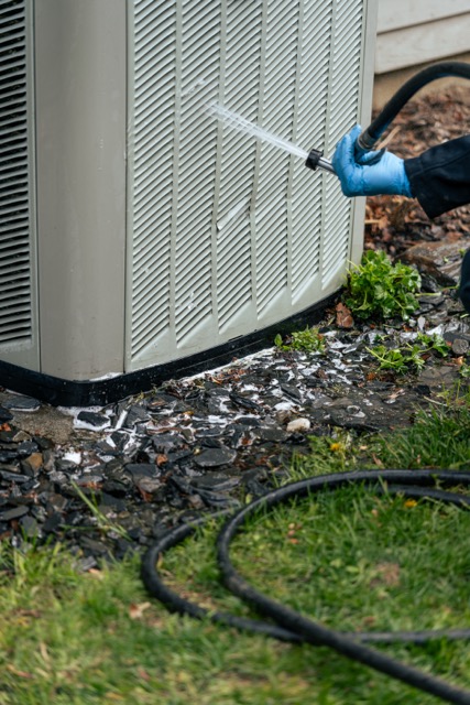 Careful condenser cleaning demonstrates Lloyd Plumbing, Heating, Air, Electrical's commitment to reliable HVAC maintenance and lasting performance.