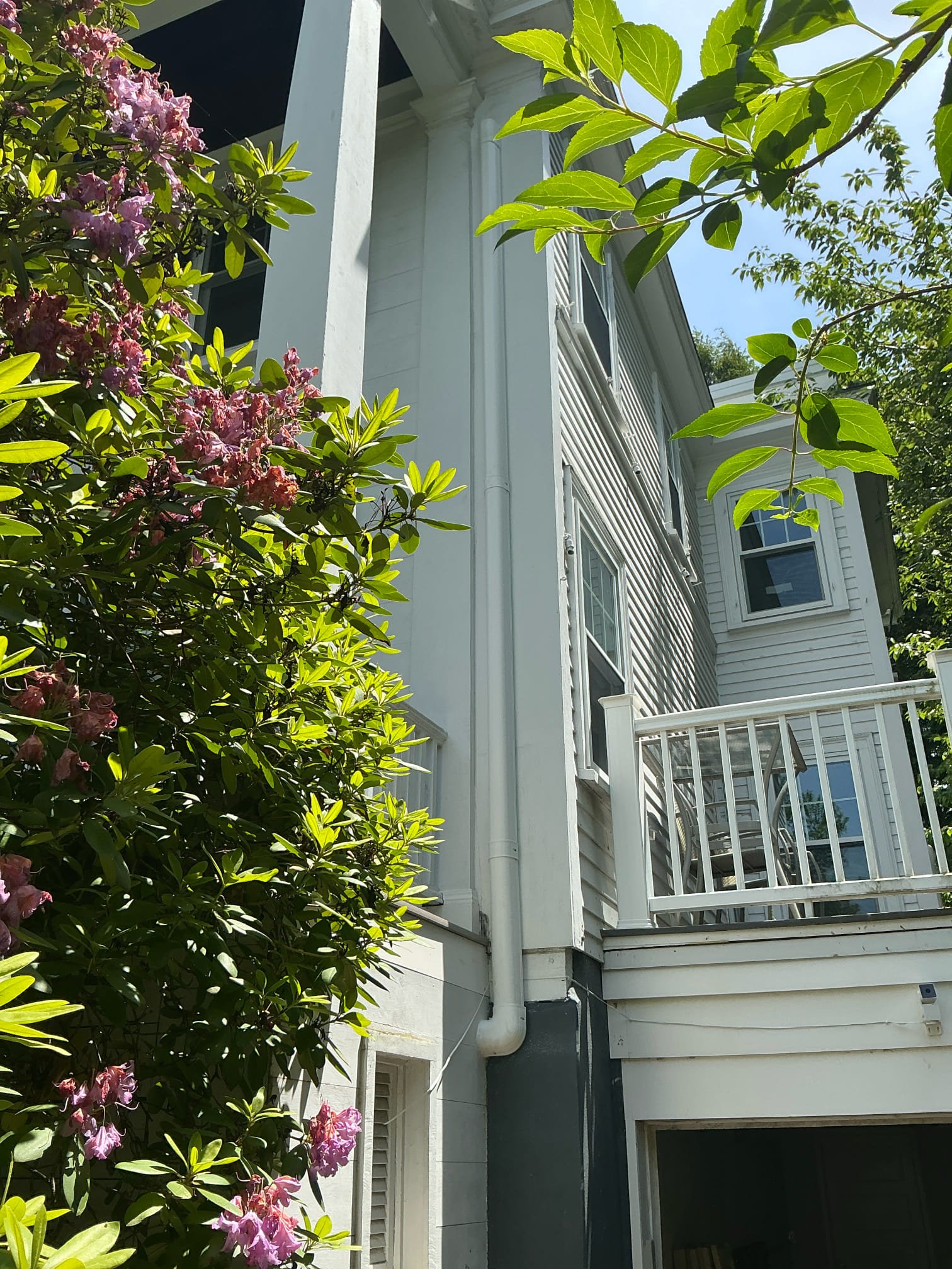 Bright, well-maintained exterior details show the care Akian Plumbing, Heating, Cooling & Electric brings to residential property services.