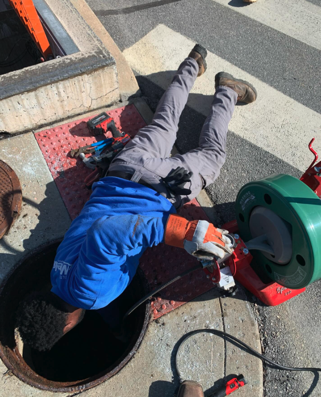 Hope Plumbing demonstrates professional, on-site drain service with skilled technicians using specialized equipment for fast, reliable results.