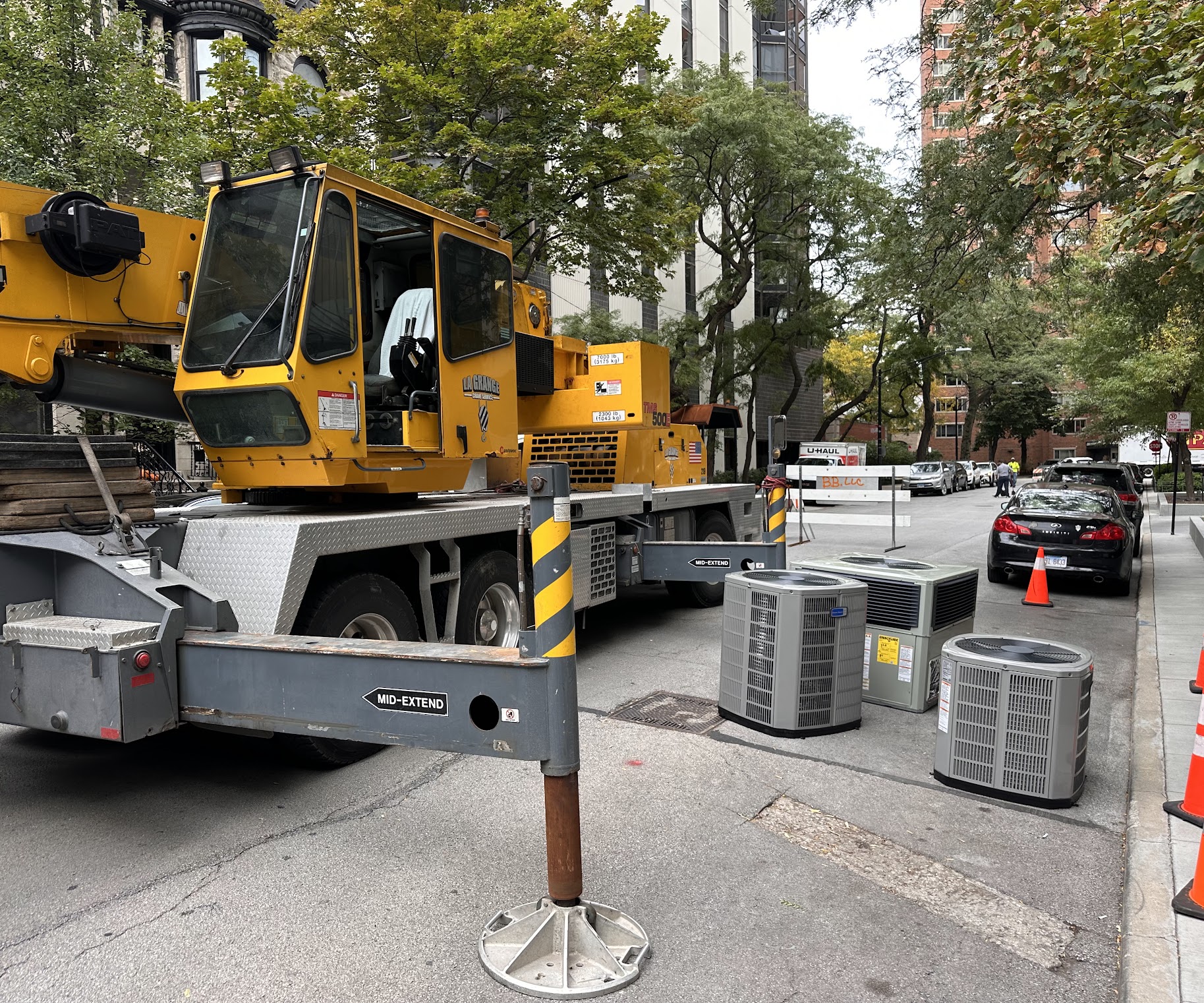 Skilled technicians from Oasis Heating and Cooling safely manage a downtown HVAC replacement, delivering durable results and minimal disruption.
