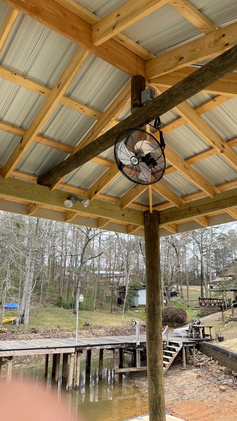 A well-executed outdoor installation keeps waterfront spaces comfortable and safe, as shown by C&T Electric LLC's careful work.