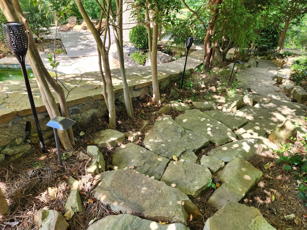 Enhance your garden's charm with perfect lighting solutions from Aardvark Electric, Inc., where quality meets nature.