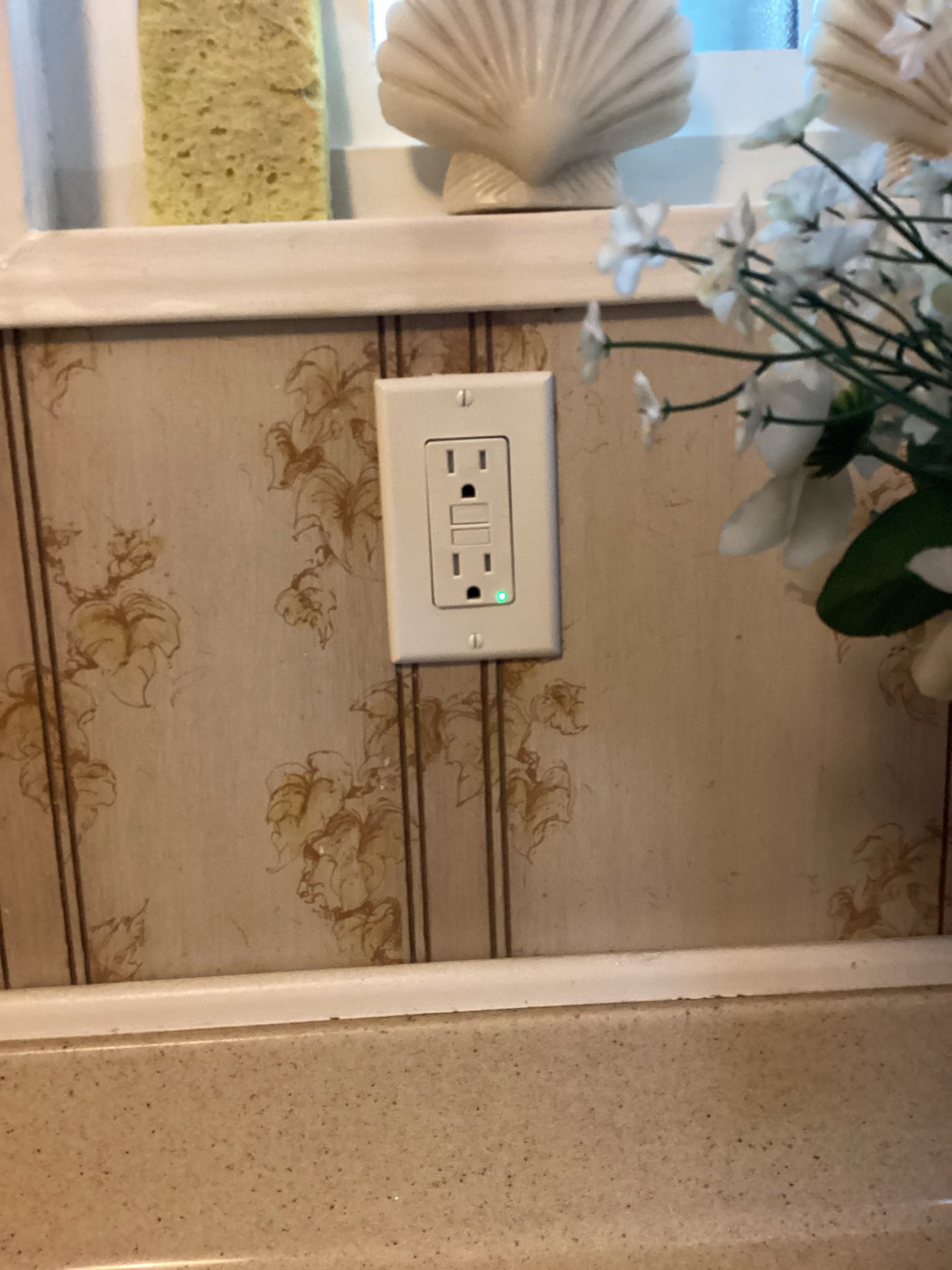 Powell Electric installed a reliable GFCI outlet for added kitchen safety, giving homeowners confidence and lasting protection.