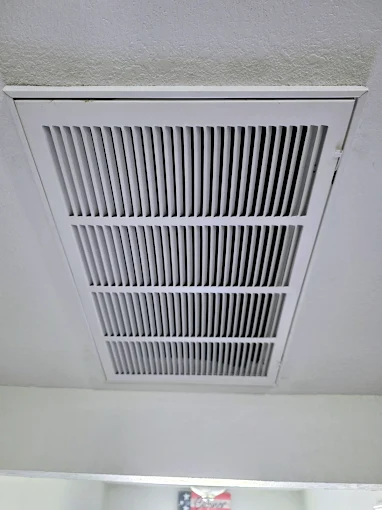 A clean, well-maintained return vent highlights the reliability and care customers expect from AccuTemp Heating & Air Conditioning.