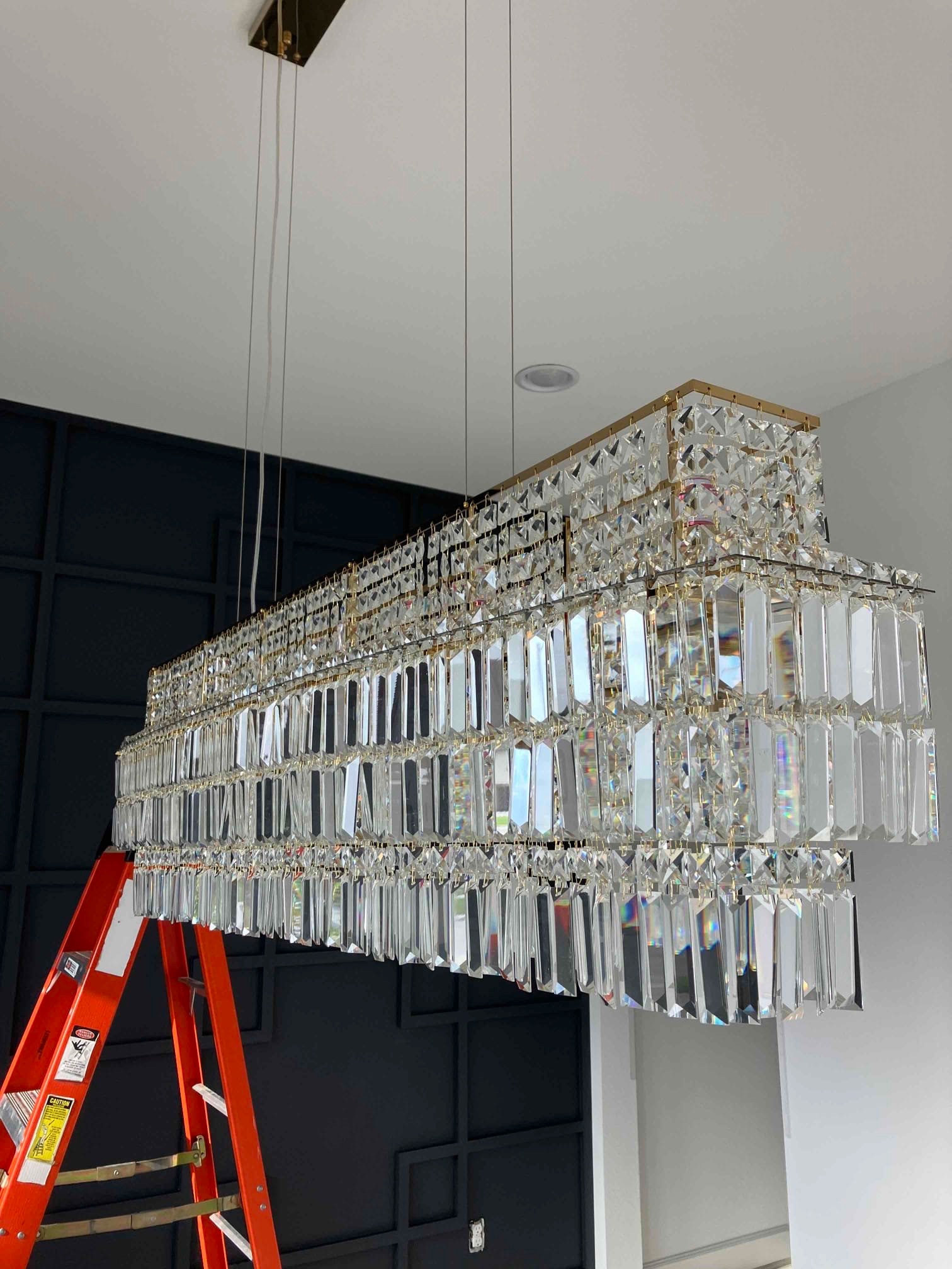 West Houston Electric, Inc. ensures careful, high-quality chandelier installation that protects your finished interior and enhances long-term value.