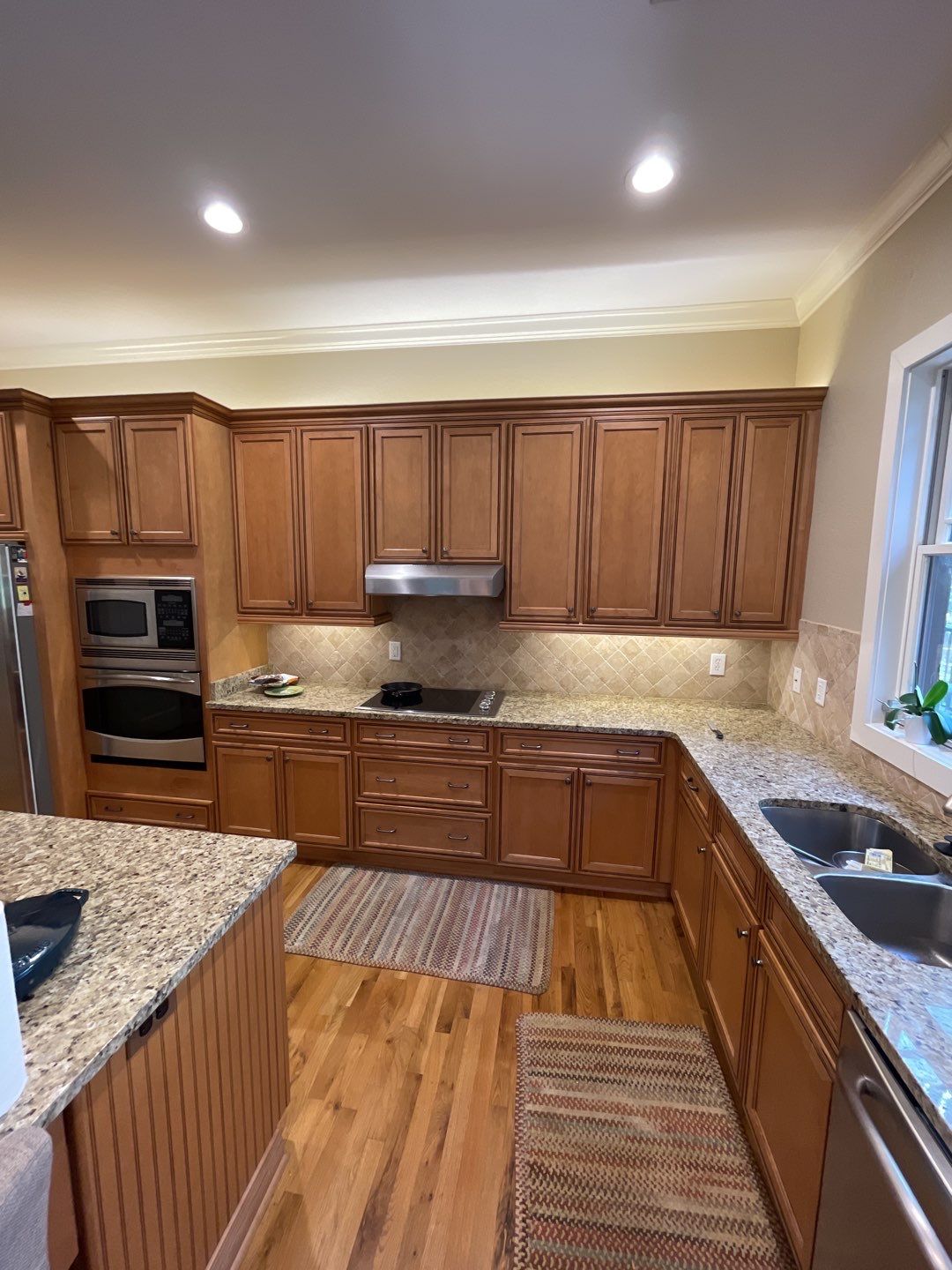 Showcasing reliable craftsmanship and bright, clean lighting, C&T Electric LLC helps kitchens look and function their best.