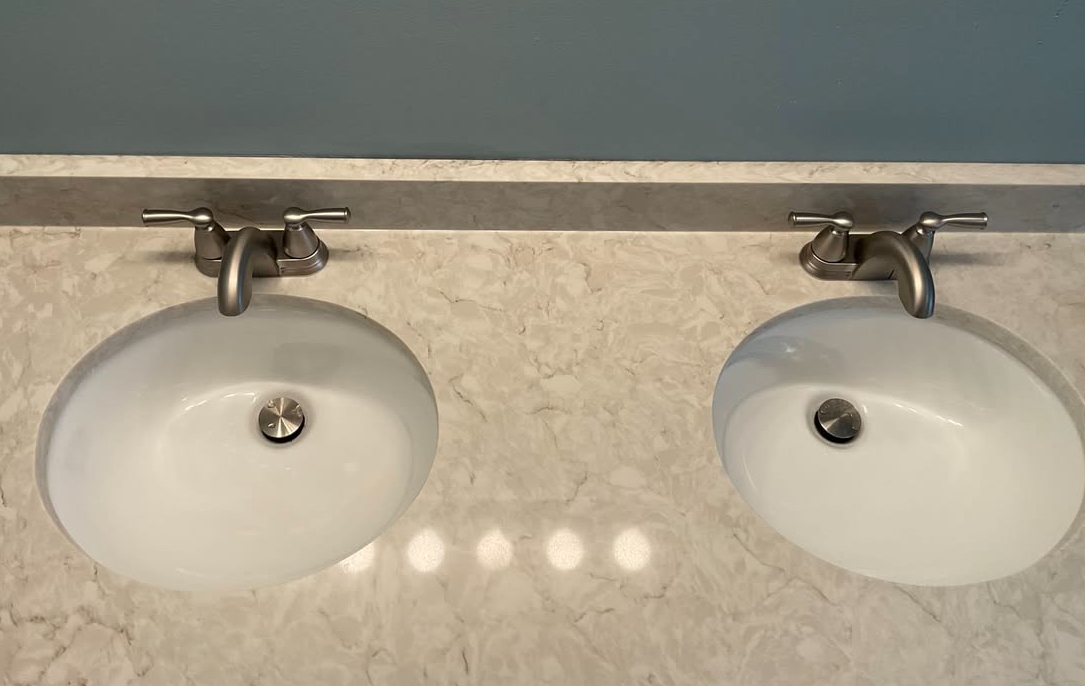 Upgrade your space with Paul The Plumber's elegant double sink solutions, ensuring quality and modern plumbing efficiency in every installation.