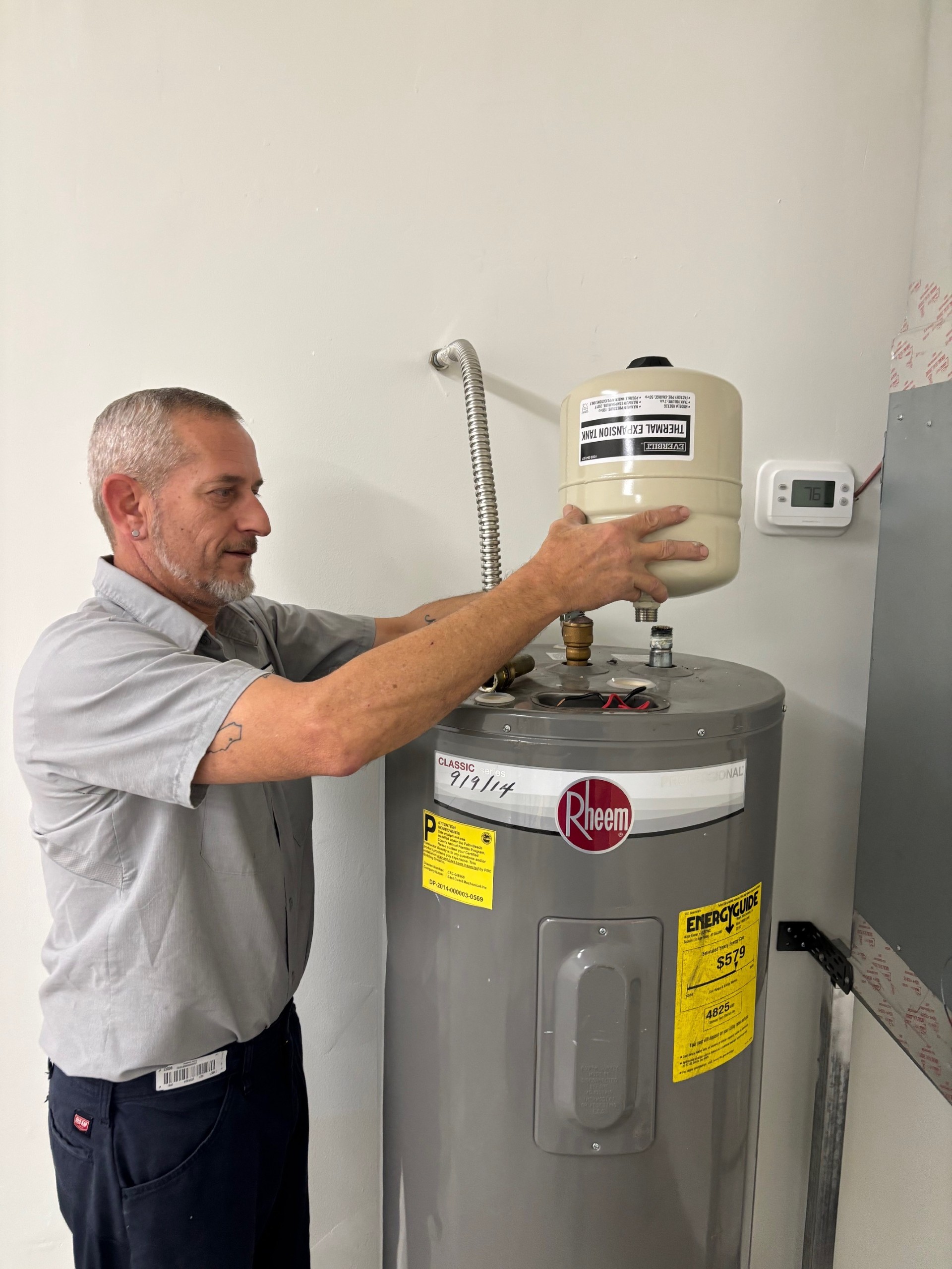 Experience top-tier plumbing services with ECM Air Conditioning, where our skilled professionals ensure your water heater installation is done right.