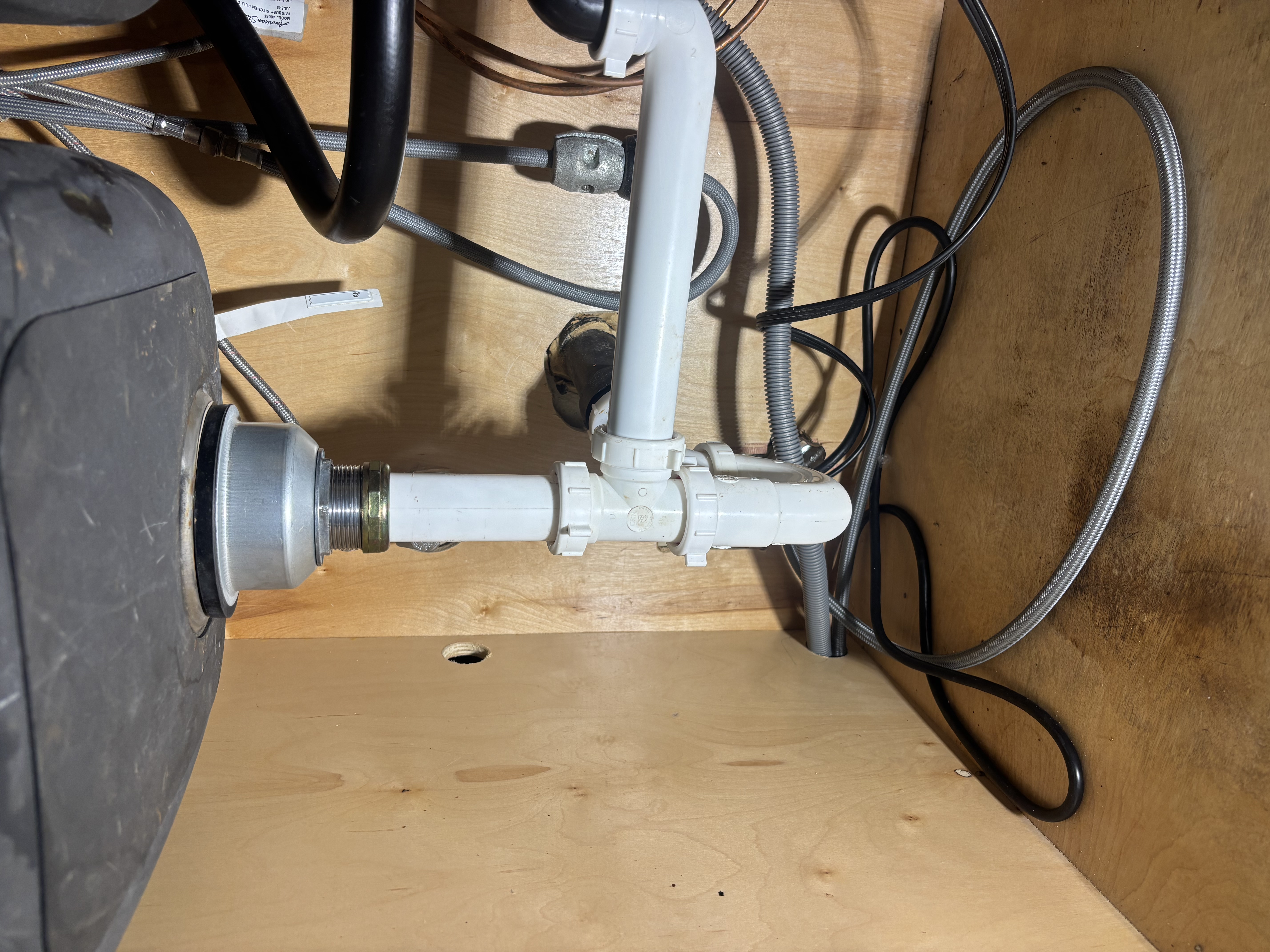 Island Plumbing shows dependable craftsmanship under the sink, with secure fittings and materials that help prevent future leaks.