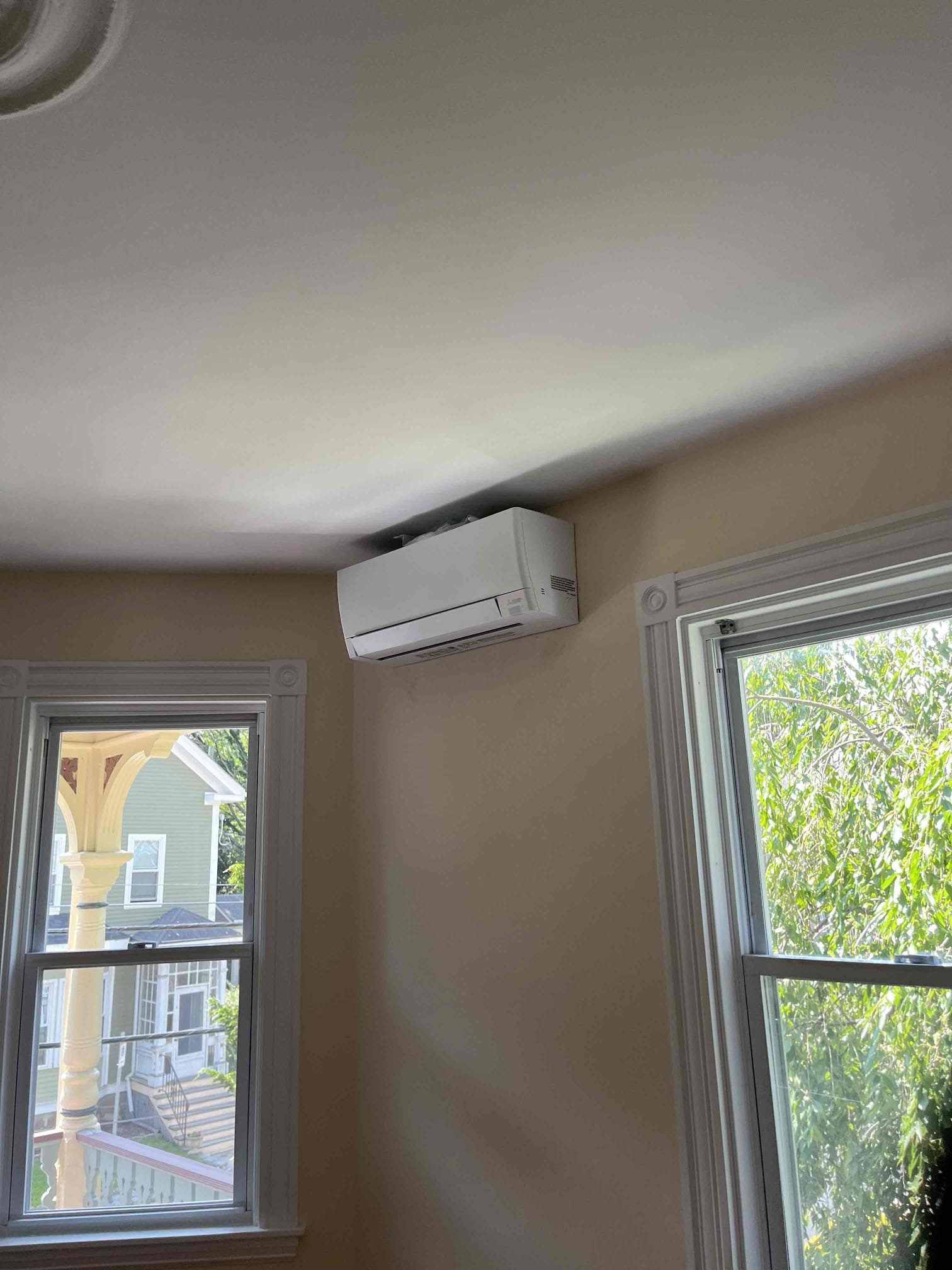 Comfort-focused installation shows how Akian Plumbing, Heating, Cooling & Electric brings quiet, efficient ductless cooling to your home.