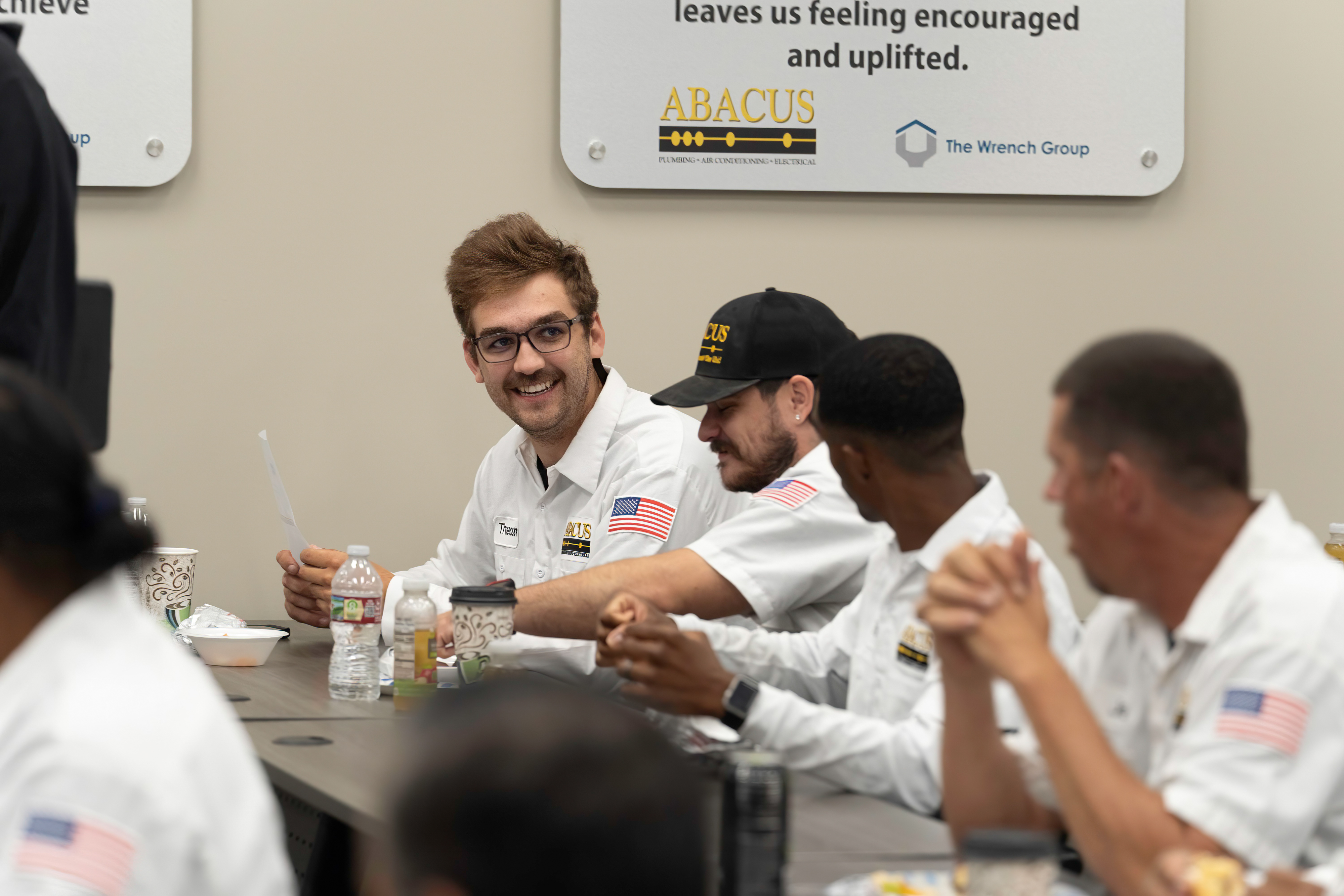 Friendly, professional technicians from Abacus Plumbing, Air Conditioning, & Electrical collaborate in training to ensure reliable service for every customer.