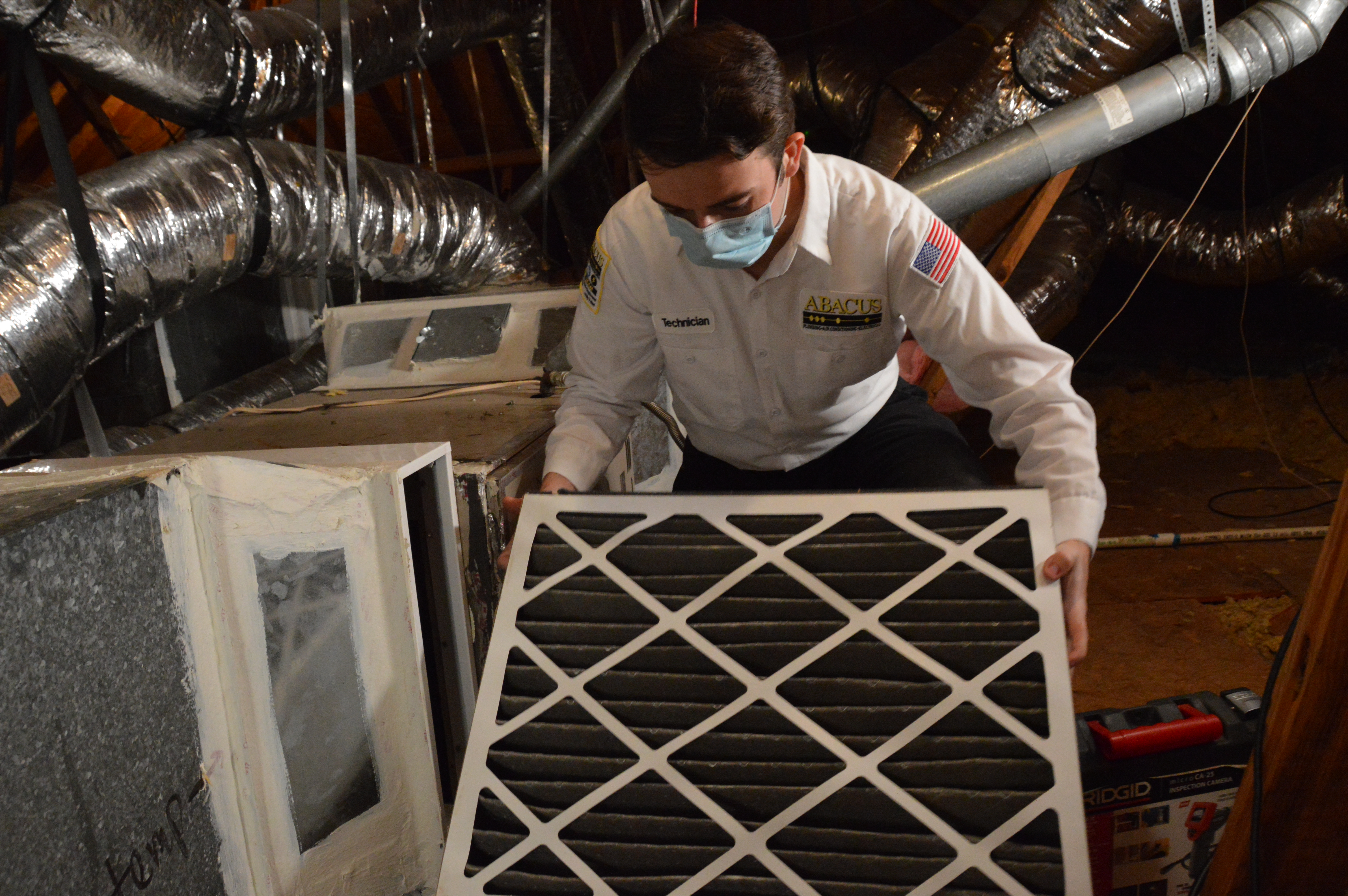 Showing careful maintenance and attention to detail, Abacus Plumbing, Air Conditioning, & Electrical replaces filters to keep your home’s HVAC running efficiently.