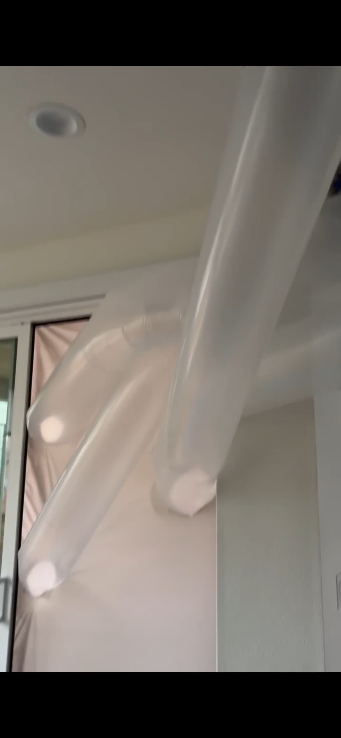 Colorado Cleanup Services installs professional containment barriers to protect your home during remediation, demonstrating careful, dust-free work.