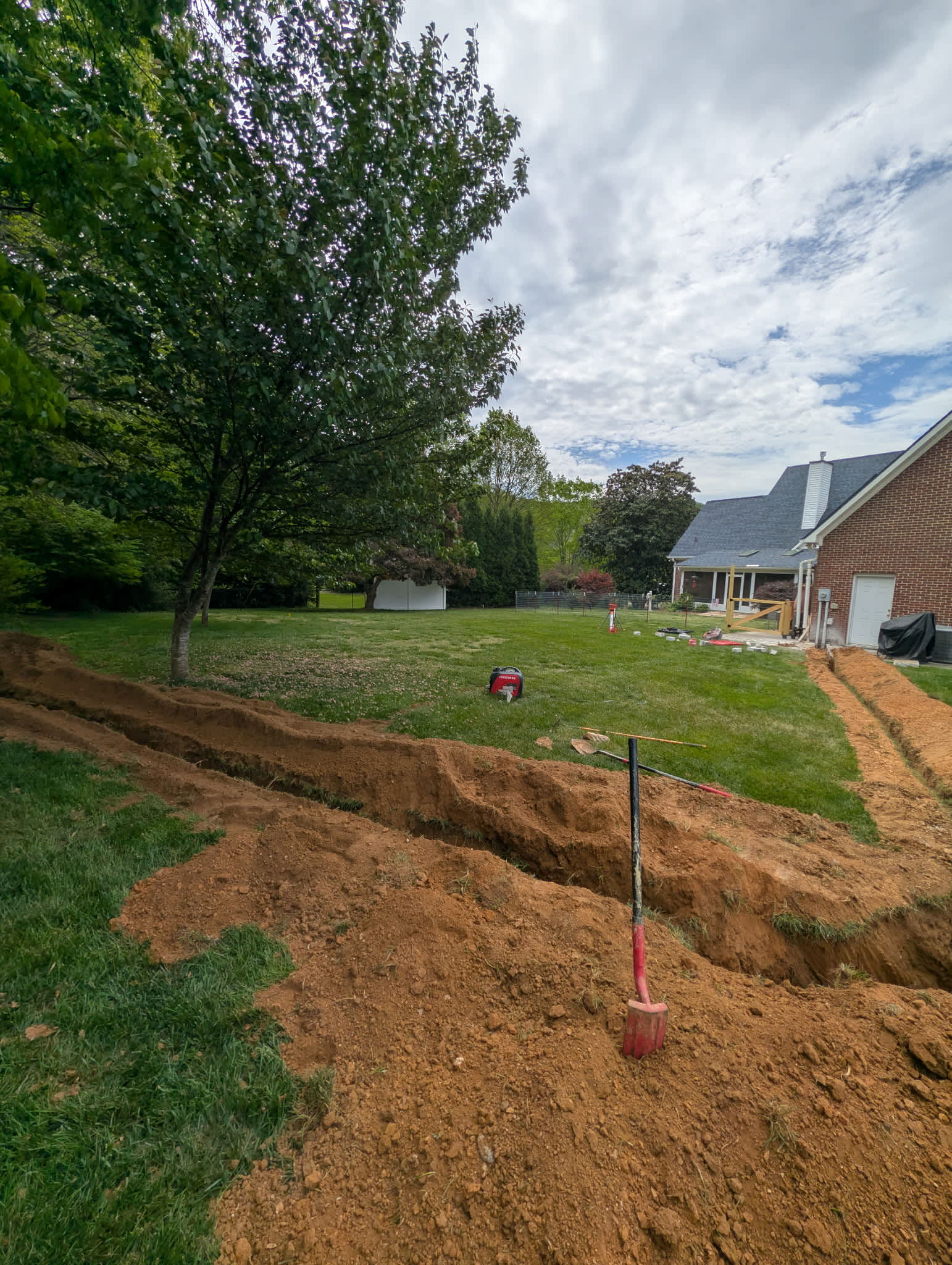 Atomic Electric Service Inc. shows careful trenching and site care for a residential electrical project, demonstrating dependable craftsmanship.