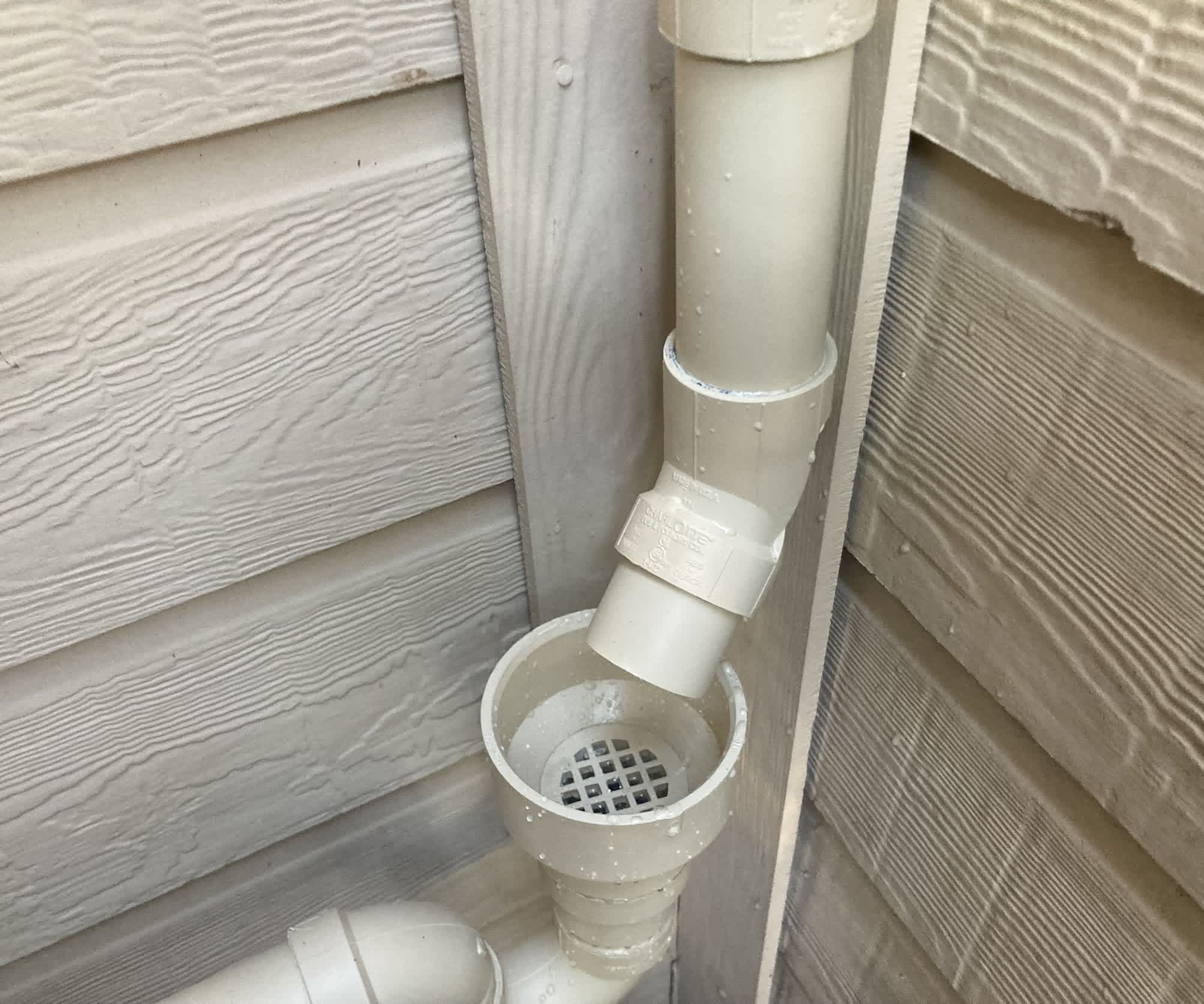 Reliable exterior drainage and clean installation highlight Abacus Plumbing, Air Conditioning & Electrical commitment to durable, professional work.