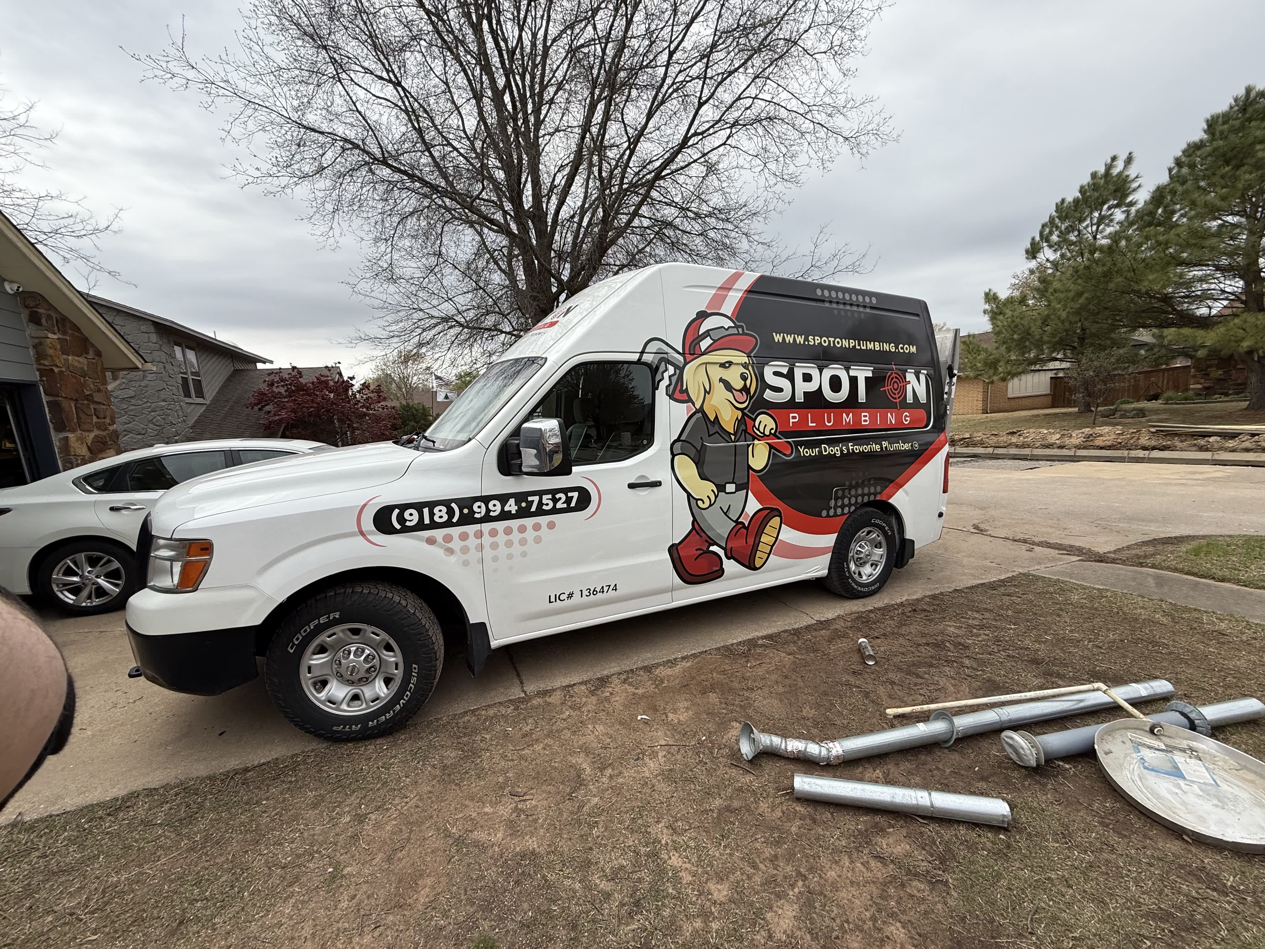Spot On Plumbing: Your Dog's Favorite Plumber in Tulsa, ready to tackle all your plumbing needs with professionalism and a smile!