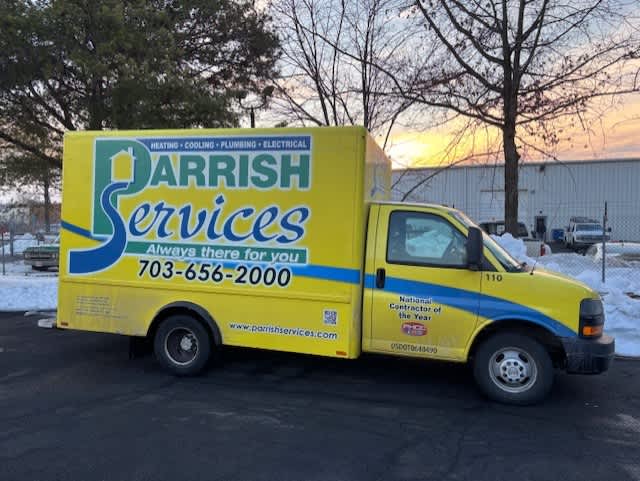A Parrish Services van showcases trusted, professional craftsmanship and fast response for heating, cooling, plumbing, and electrical needs.