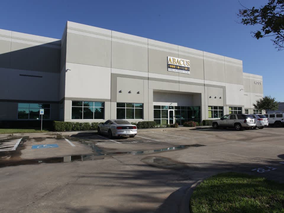 A clean, professional exterior and prominent signage show Abacus Plumbing, Air Conditioning & Electrical is ready and reliable for customers.