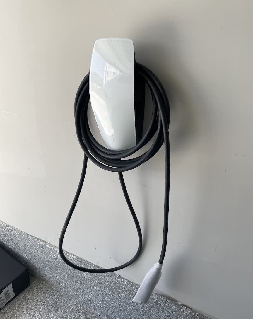 Dependable EV charger installation shows Abacus Plumbing, Air Conditioning, & Electrical delivering clean, professional electrical solutions for modern homes.