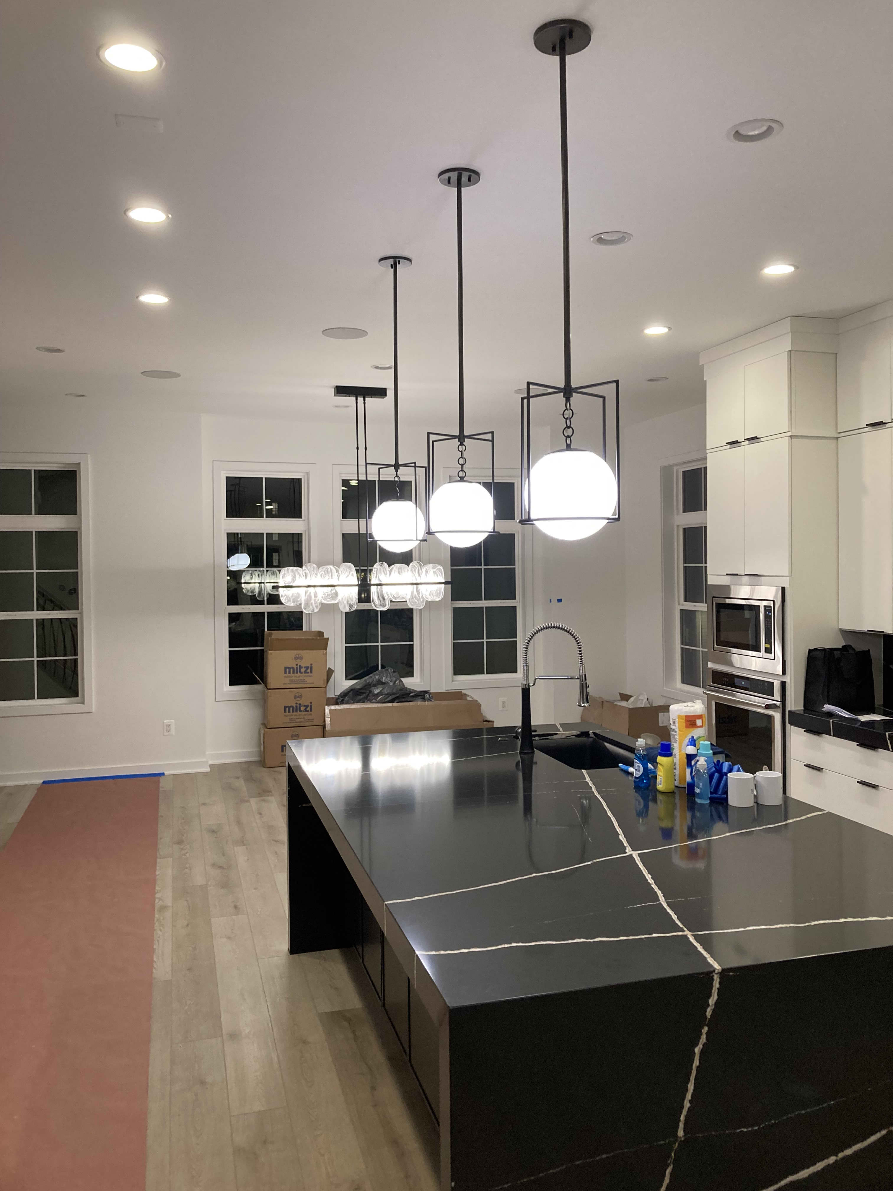 Illuminate your home with Absolute Electric LLC's expert lighting installation services.